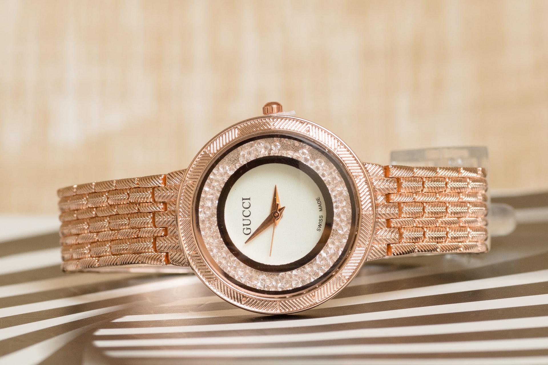 gold-wristwatch-in-close-up-photography